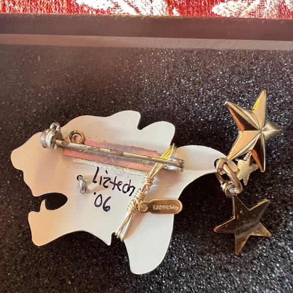 Black and Gold Lion Brooch with Star Accents - Picture 3 of 4